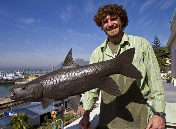 16. With a mahseer bronze an Asian gamefish on the balcony of his Kalk Bay studio